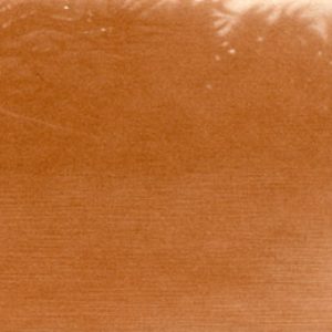 figure in kayak on river